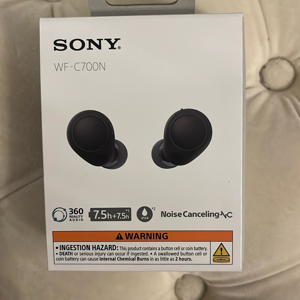 Brand new Sony black WFC 700 and noise canceling headphones.